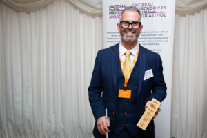 2026 New Perspectives Award winner Gareth Davies with his trophy at our award ceremony in Westminster